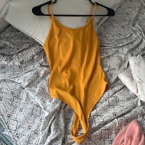 Yellow bodysuit